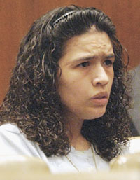 Elsa Garcia listens to testimony being given during the hearing.